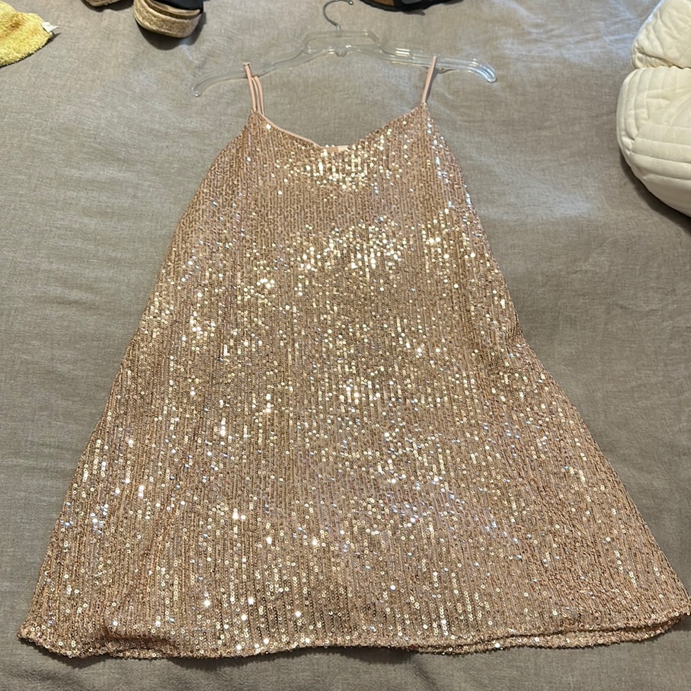 Brand new (with tags) light pink sparkly dress!! Super flowy and cute!